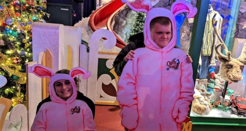 Two students pose as bunnies at Casa Noel